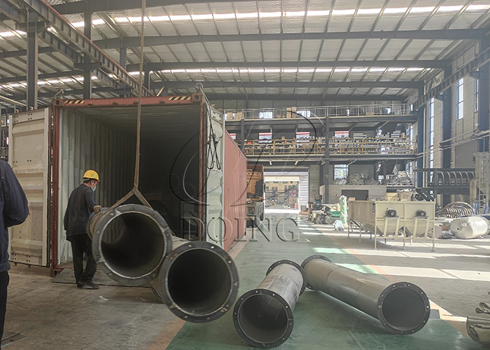 semi-automatic cassava flour processing equipment being loaded 